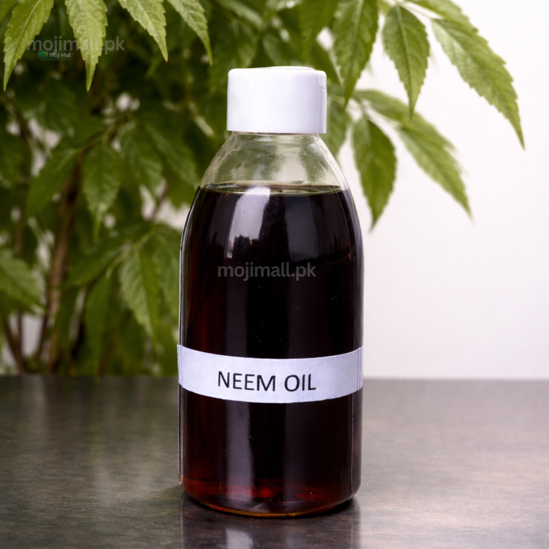 Bottle of neem oil with a plant in the background