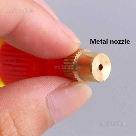 Gold metal nozzle held between fingers with 'Metal nozzle' text