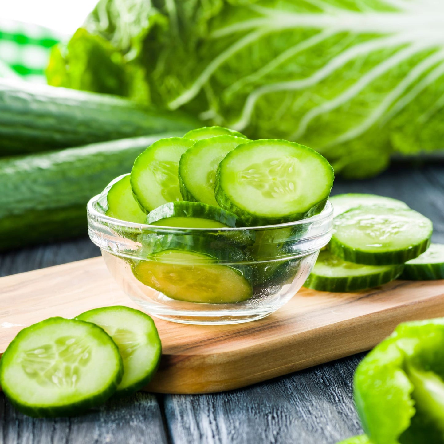 Freshly sliced cucumber, cultivated from moji mall seeds, offering a refreshing, hydrating crunch.