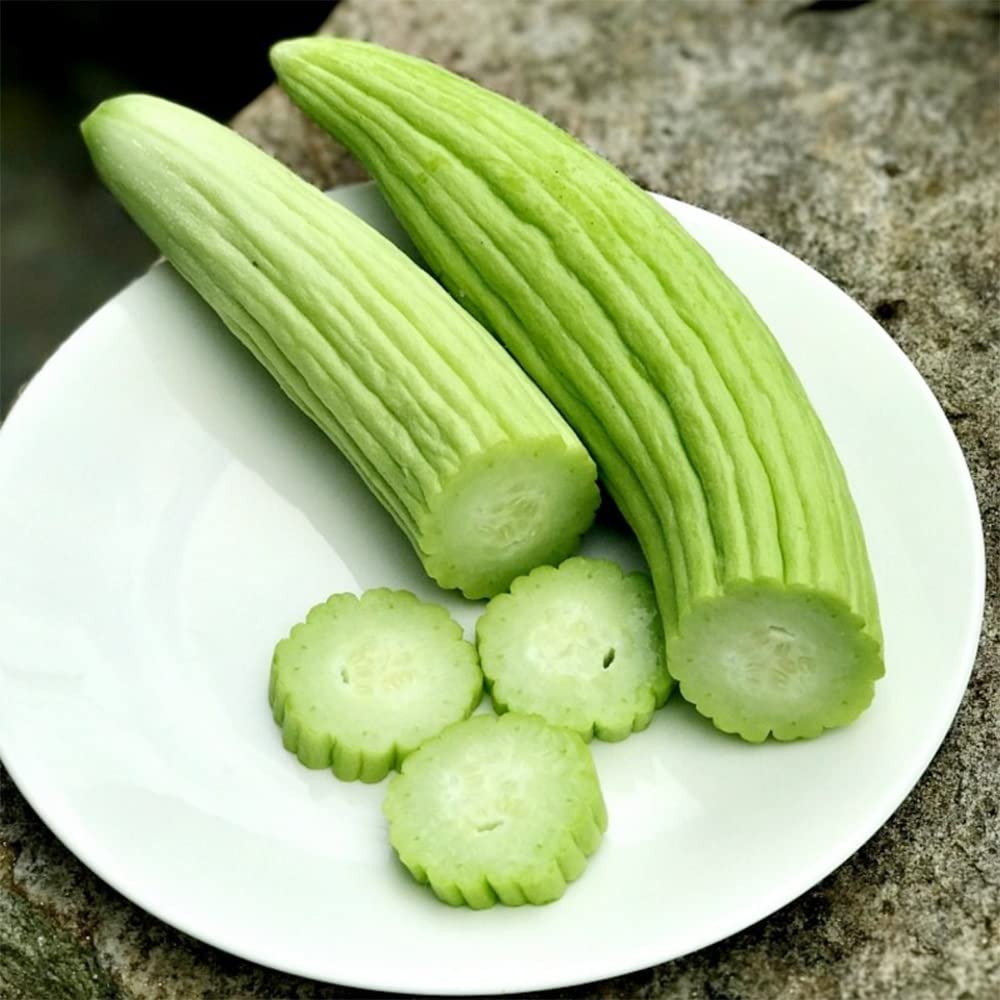 Freshly cut Kakri cucumbers from Mojimall, offering a crisp, refreshing crunch, perfect for healthy salads, salsas, or snacks.