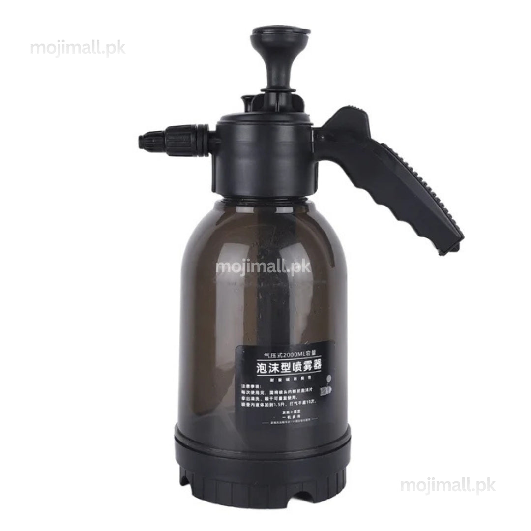 Black 2L manual pressure sprayer with a hand pump and adjustable spray nozzle for watering plants and garden spraying in Pakistan by Moji Mall.