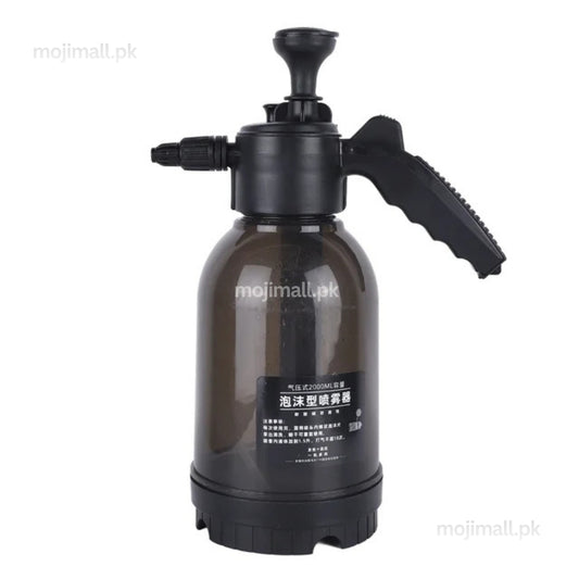 Black 2L manual pressure sprayer with a hand pump and adjustable spray nozzle for watering plants and garden spraying in Pakistan by Moji Mall.