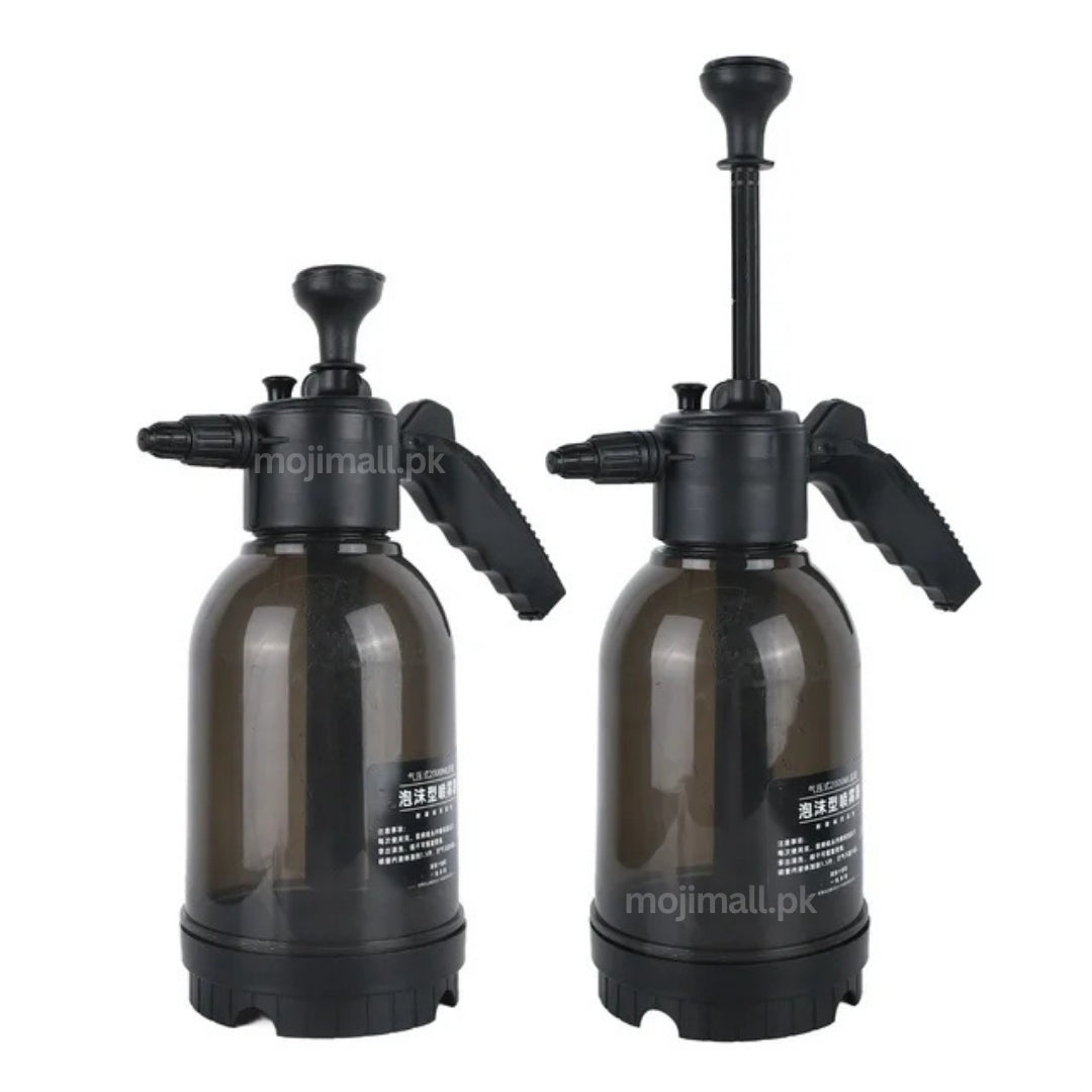 Black 2-litre pressure sprayer featuring a manual pump and adjustable nozzle for gardening and plant care in Pakistan by Moji Mall.